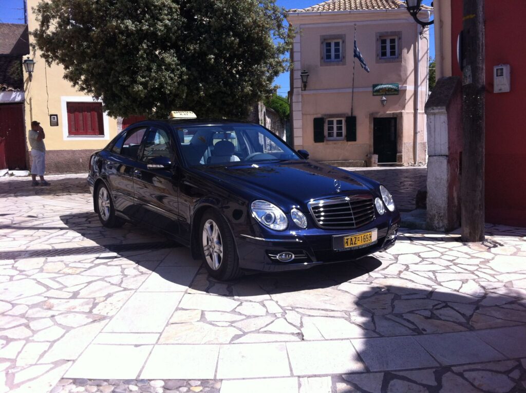 Black Mercedes taxi used for Corfu airport pickup and private island tours